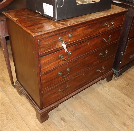 A George III mahogany chest fitted four graduated long drawers W.94cm